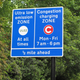Signs demarcating the Congestion Charge and ULEZ zones in Central London.